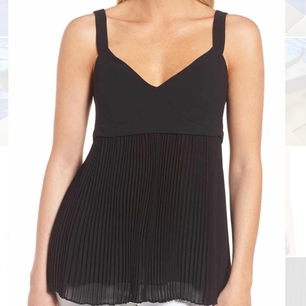 Two part sleeveless blouse with pleated bottom